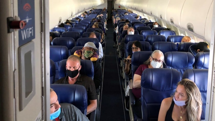 Passengers wearing masks