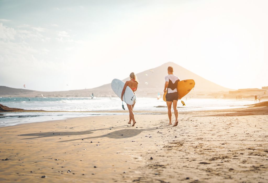 surfer couple in bali