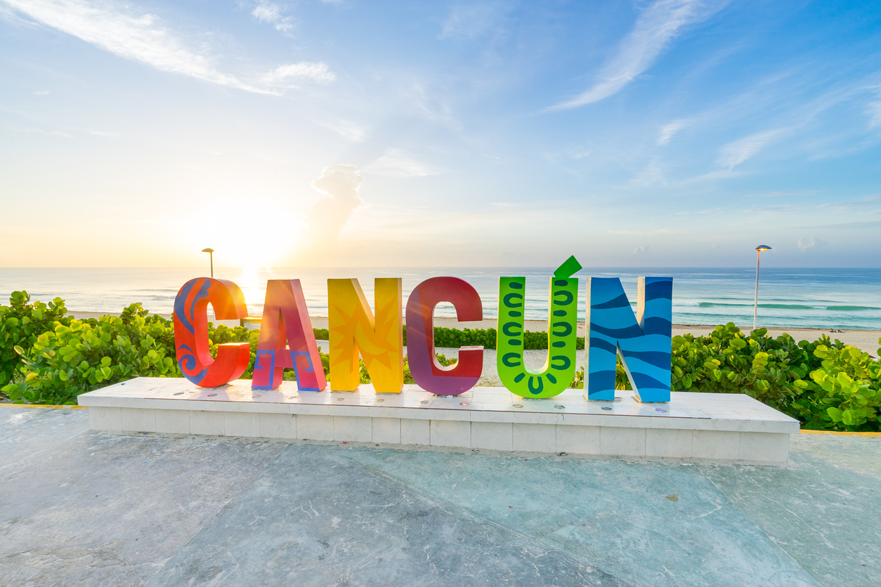 Cancun sign at sunrise