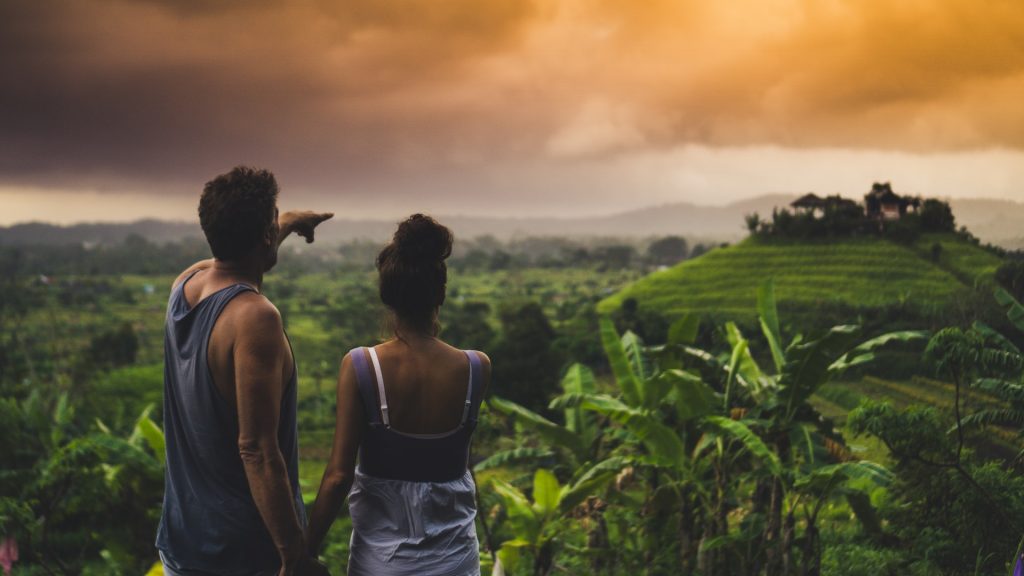 couple exploring bali rice fields