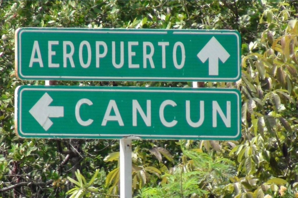 cancun airport road sign
