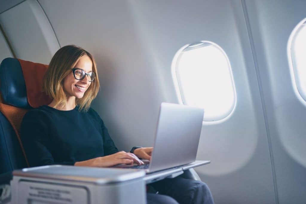 woman flying in business class
