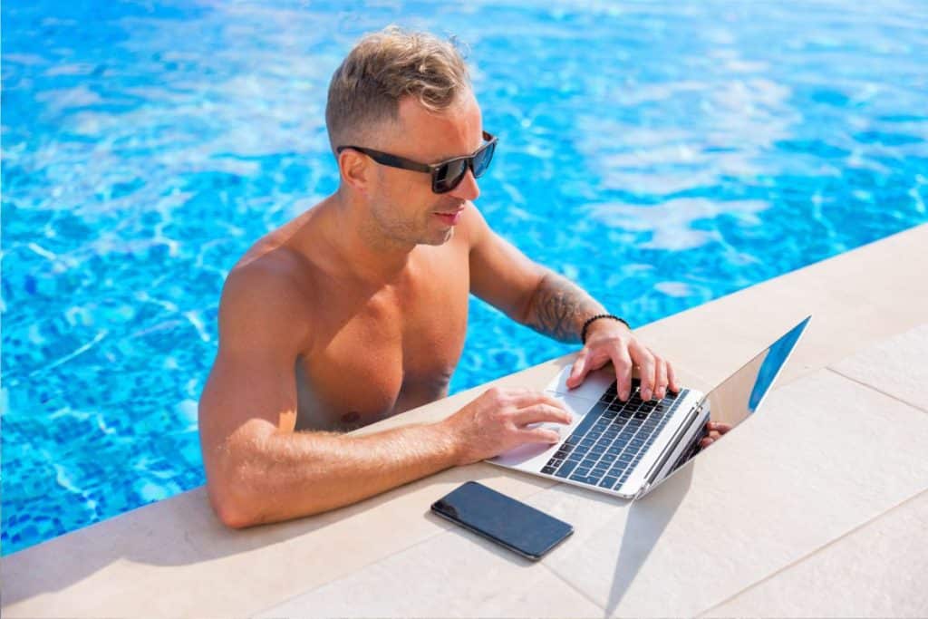 10 Remote Jobs You Can Do From Anywhere That Pay $100K+ A Year